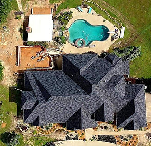 Birds eye view of a black roof in Texas from the top down