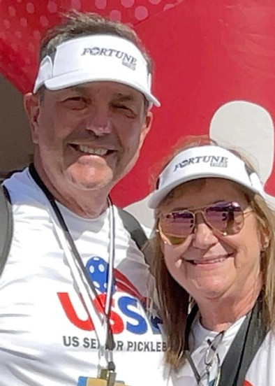 Doug and his wife Roxanne posing at at pickeball tournament