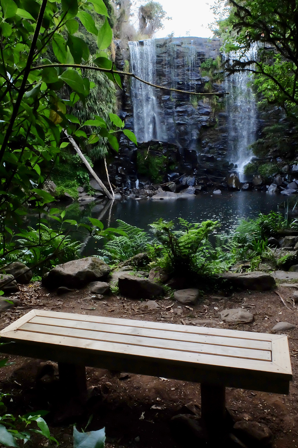 Seat at the base of the falls