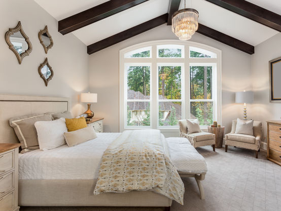 master bedroom with large white windows.jpeg
