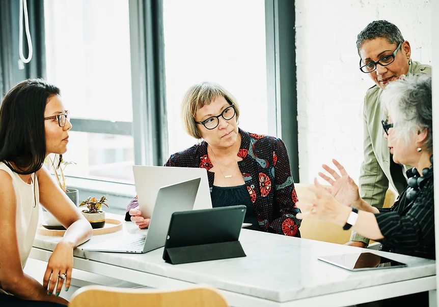 A group of women at a business meeting.webp