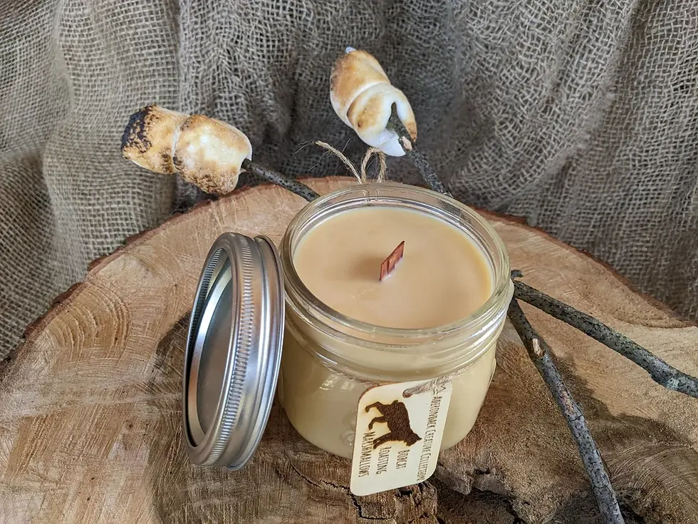 Thumbnail: squatty 12 ounce mason jar soy candle with wood wick and wooden engraved tag tied on with twine.