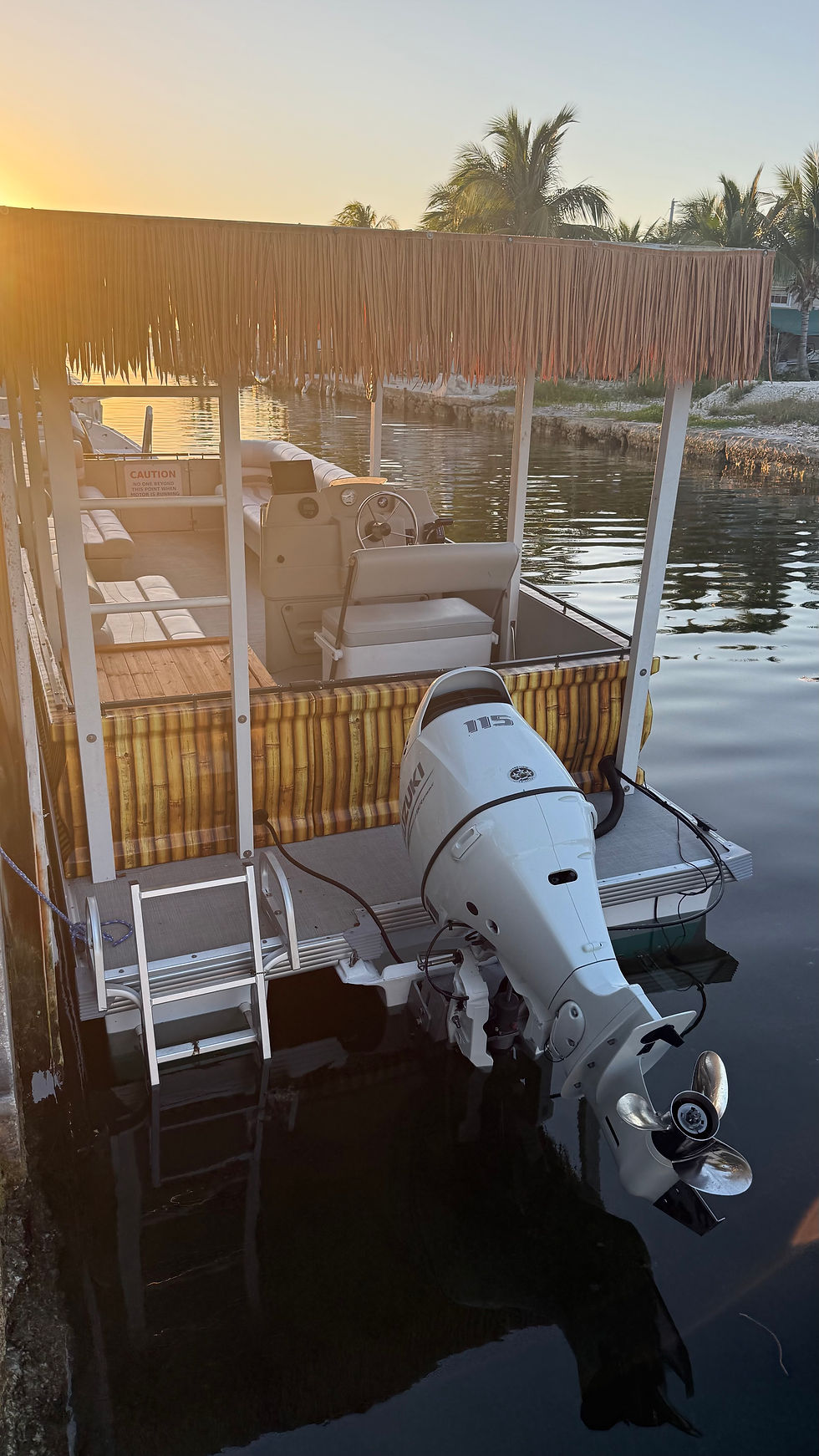 Tiki Pontoon upper sugarloaf rental stern at the dock
