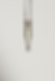 Close up image of glass dropper against cream background. Dropper is partially full with a clear serum and two air bubbles, one very small and one large. Very clean, natural, and minimalistic image