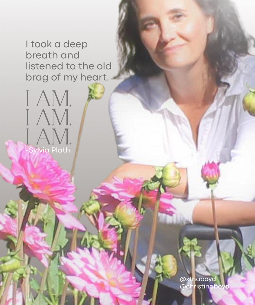 A woman (me) in a white shirt leans on a shovel among pink dahlia flowers. The text includes a Sylvia Plath quote. Mood is serene.