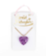 Glittery purple heart pendant on gold colored chain, carded