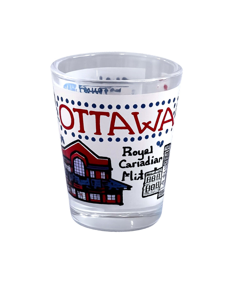 front of exclusive Byward Market shotglass by Julia Gash at Tickled Pink Ottawa