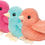 Thumbnail: 3 colorful stuffed toy chicks facing sideways
