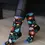 Thumbnail: Model wearing navy socks with colorful floral print, text, 'FML'