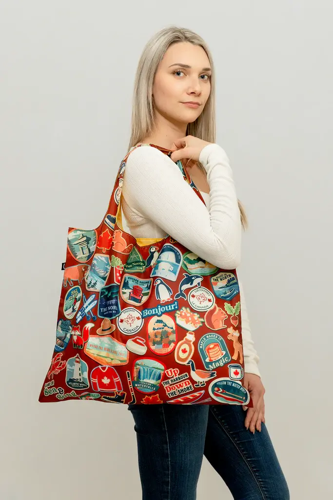 Lifestyle shot of The Maple Trail reusable tote bag being used near the ByWard Market.