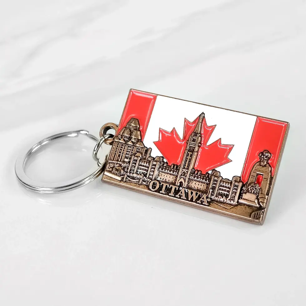 Rectangular keychain with copper skyline and flag backdrop at Tickled Pink Ottawa.