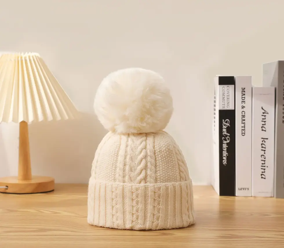 White cable knit toque with large pompom