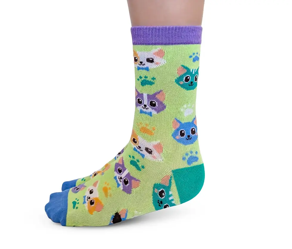 Side view of Cat Crew kids socks with various cat patterns by Uptown Sox at Tickled Pink Ottawa.