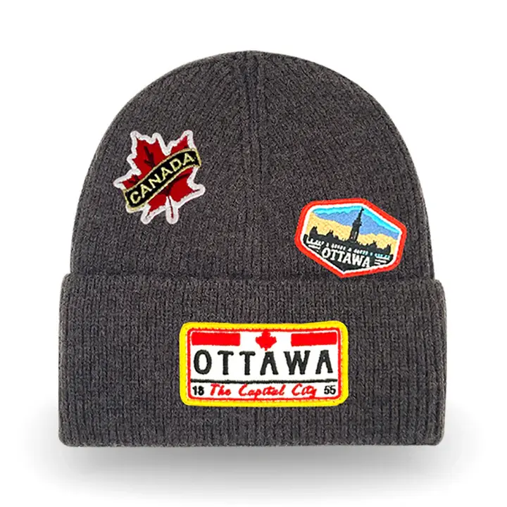 Brown knitted cuffed toque with Ottawa patches stitched on