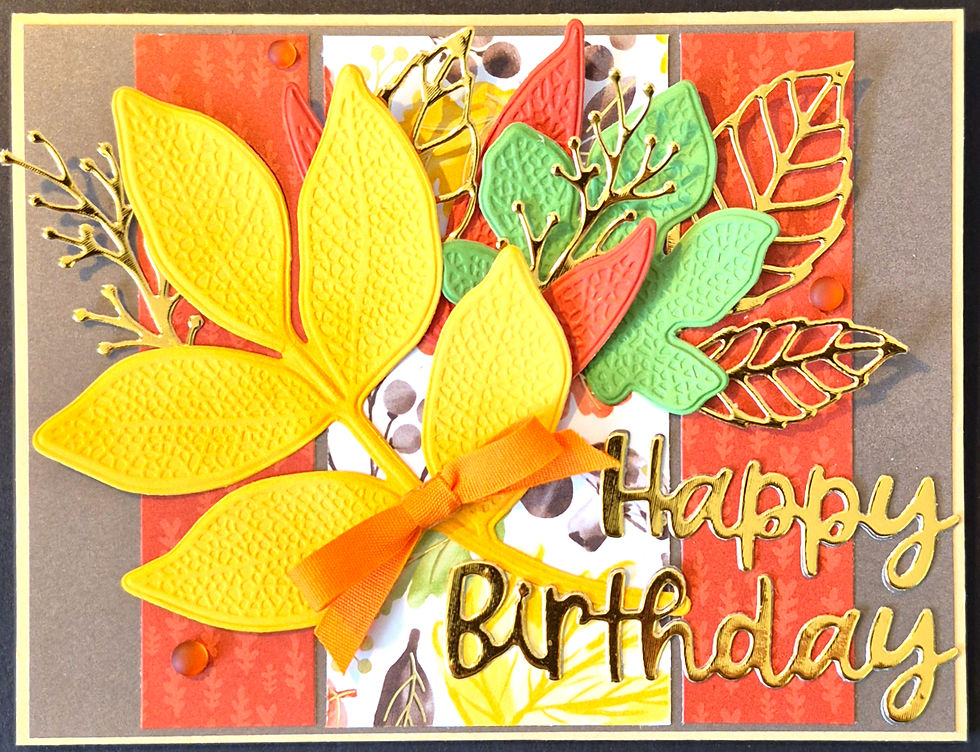 A horizontal handmade birthday card with a three-panel background and textured leaf cluster at Tickled Pink.