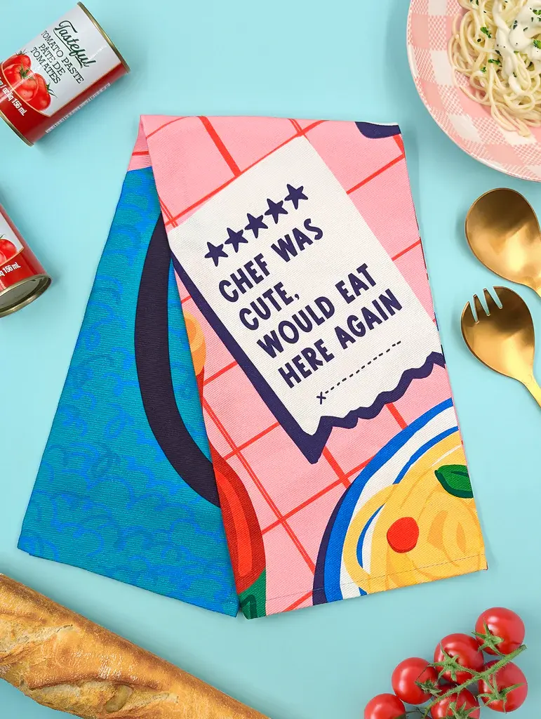 Folded Cute Chef tea towel displayed in a kitchen setting at Tickled Pink Ottawa.