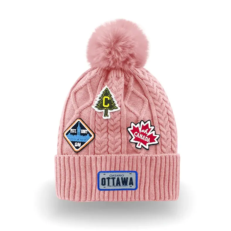 Pink cableknit pompom hat with Ottawa patches
