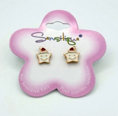 Pink flower shaped card holding pair of gold star shaped earrings with red hats