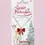 Thumbnail: Decorative cardboard display card holding red enamel bow pendant with clear rhinestone center on gold colored chain
