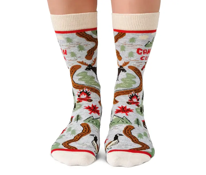 Front view of pair of light gray socks with red, brown & green print of maple leaf, beaver, sugar shack & more Canadian icons