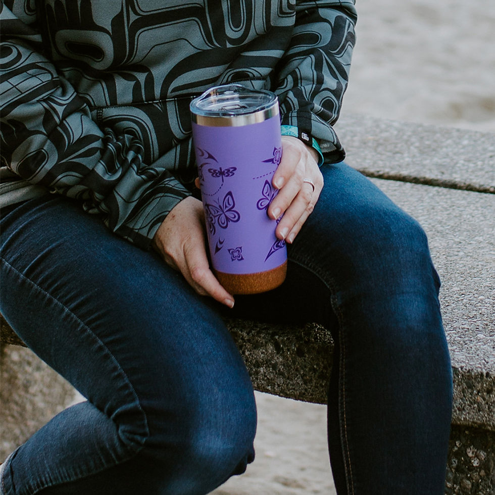 Thumbnail: Model holding large purple cork base travel mug with Hummingbird print by Simone Diamond