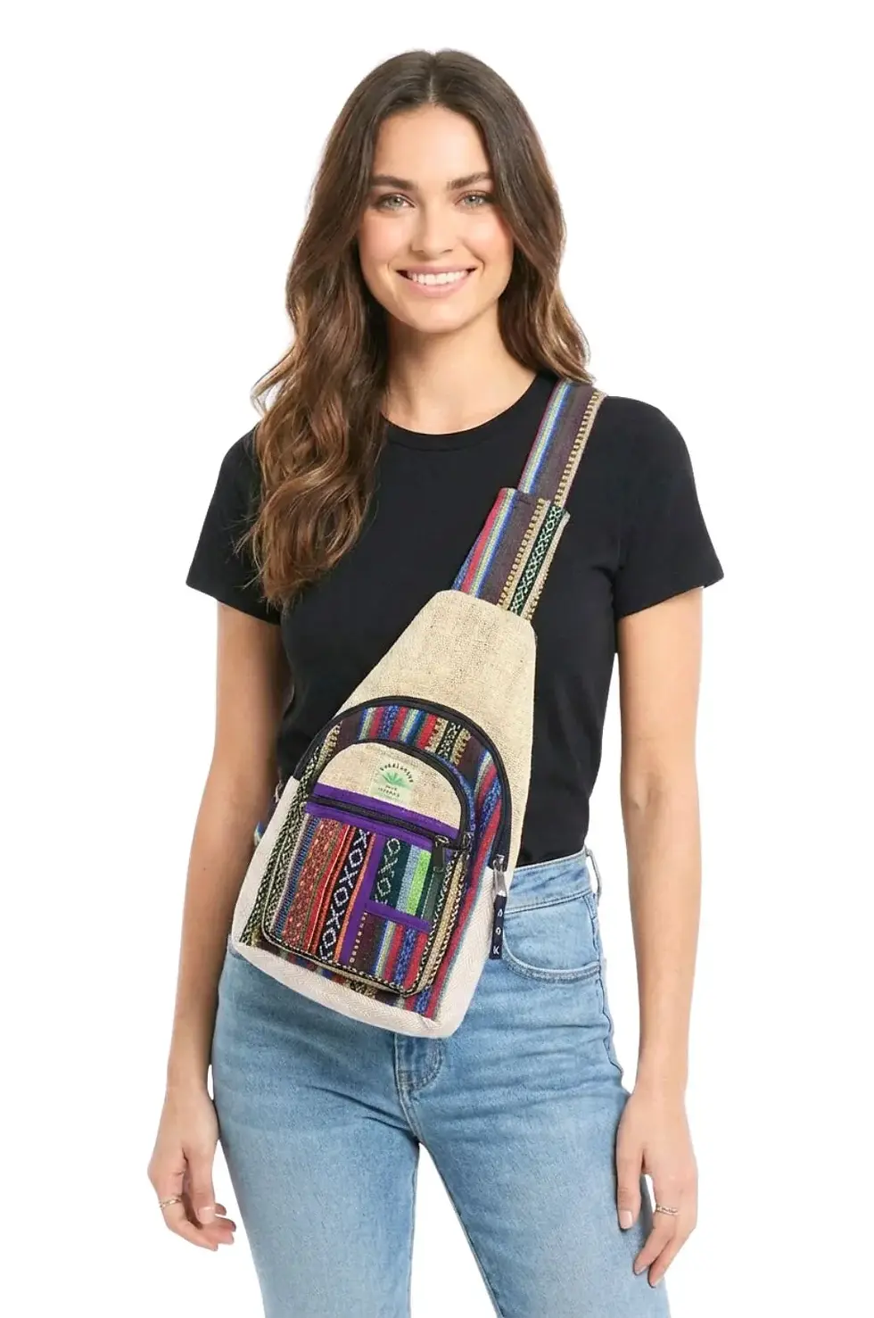 Thumbnail: Model with natural hemp colour sling-style backpack with purple striped patch accents & strap on shoulder