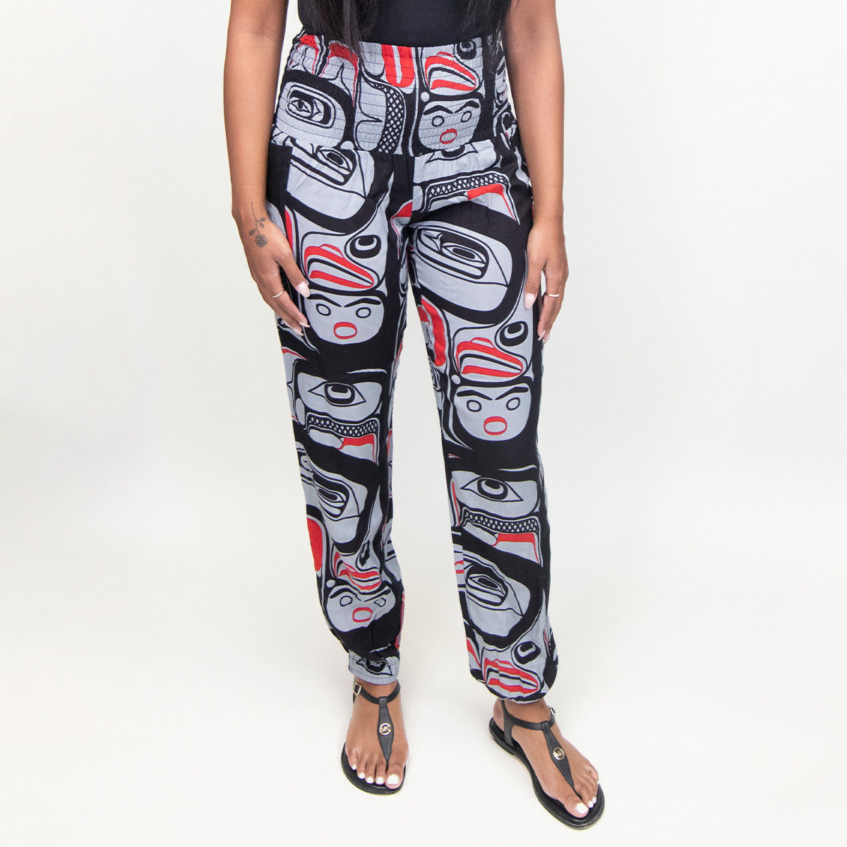Front view of Eagle Vision design comfy pants by Haida artist Allan Weir at Quichua World Market.