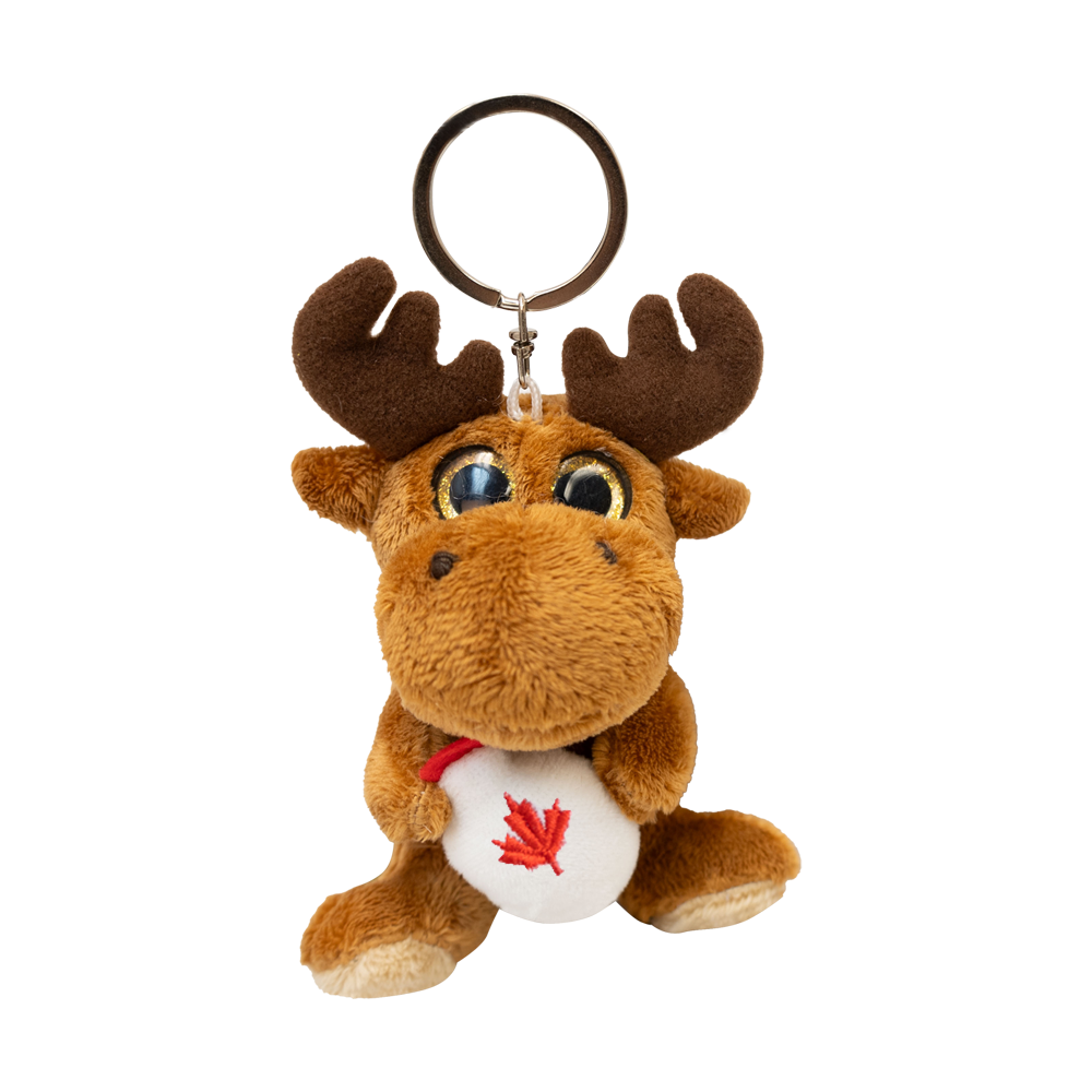Small plush moose keychain holding a maple syrup jug souvenir at Tickled Pink Ottawa