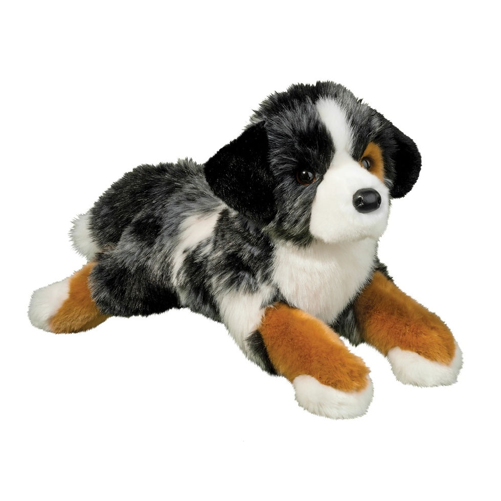 Front view of soft plush black, brown & white stuffed toy Australian Shepherd lying down position