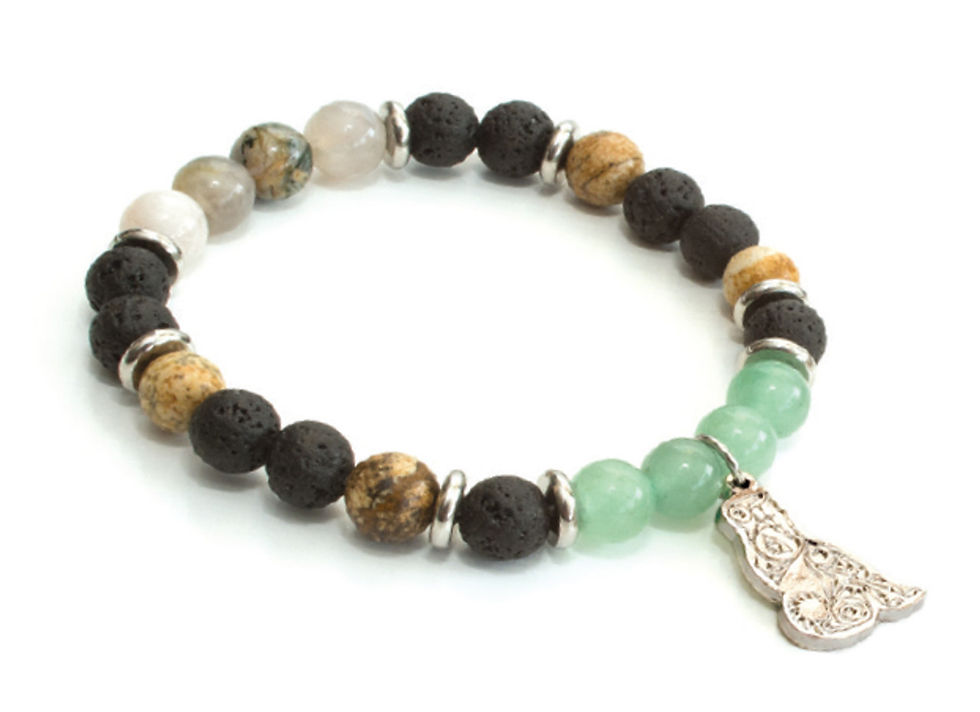 Semi-precious stone & lava beads elastic bracelet with 'Wolf' charm by T.J. Sgwaayaans Young