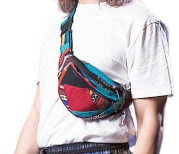 Model with patchwork hip pack slung over shoulder