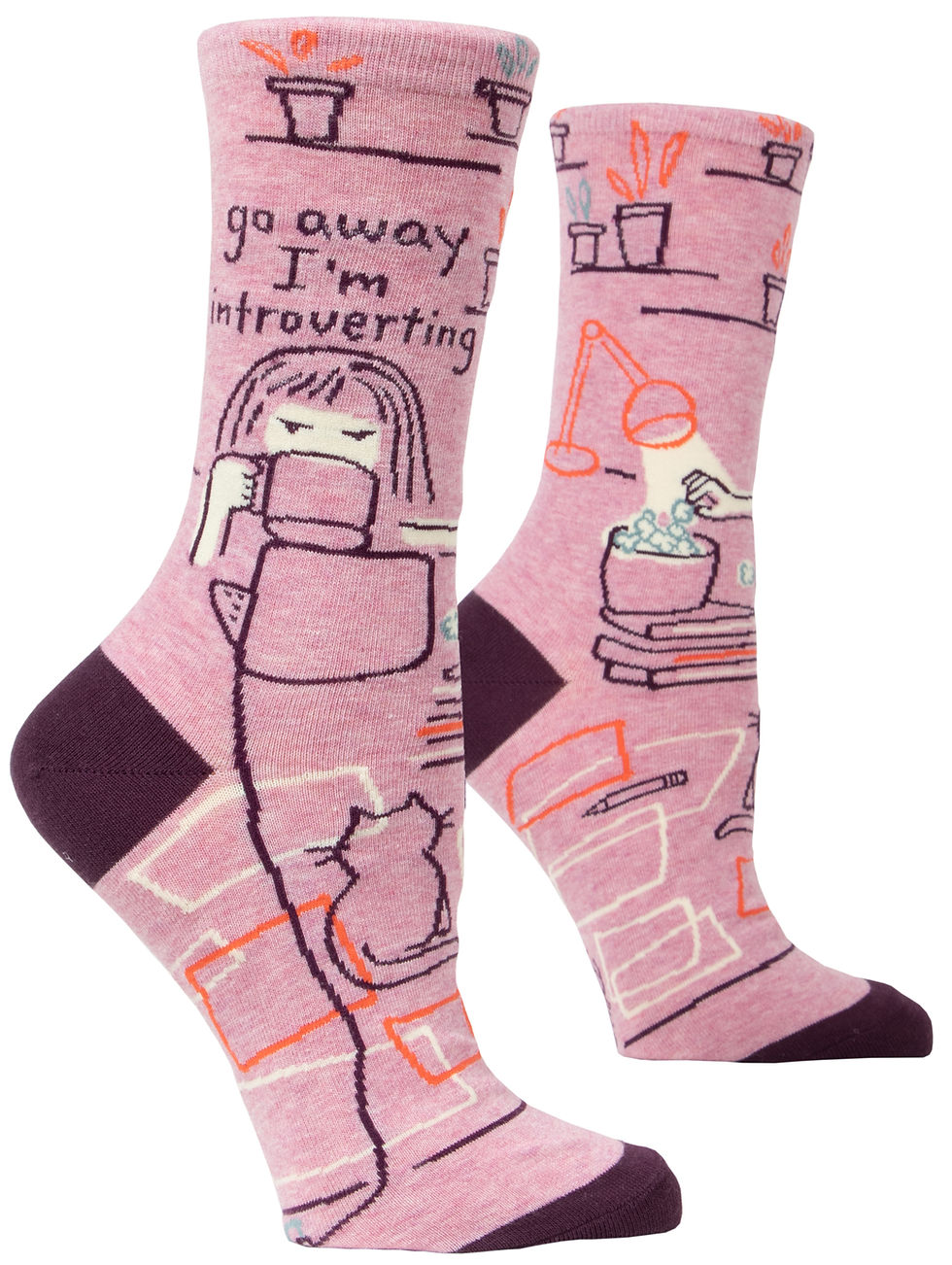 Side view of pink socks with maroon line drawing of girl with cup of tea & cat, text, 'Go Away, I'm Introverting'