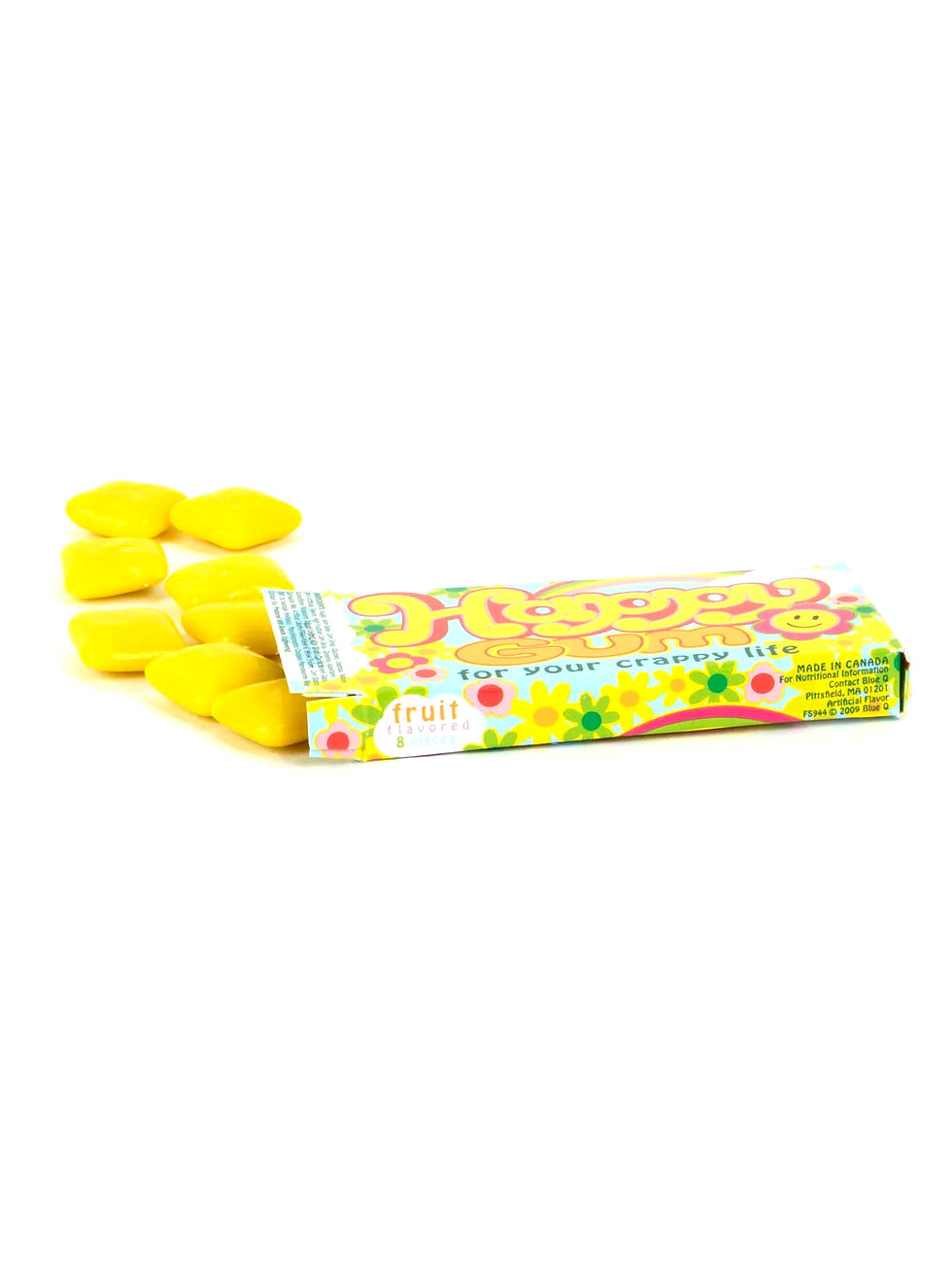 Yellow box of gum open with yellow chiclets spilling out