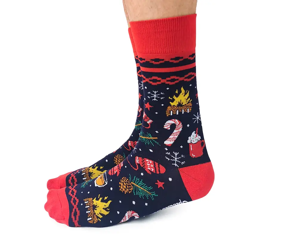 Side view of pair of black & red socks & festive holiday print