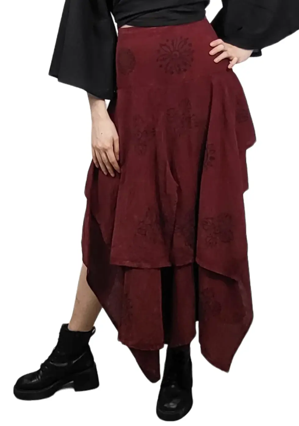 Thumbnail: Angled view of model wearing long multi-layered skirt with side slits in dark red cotton
