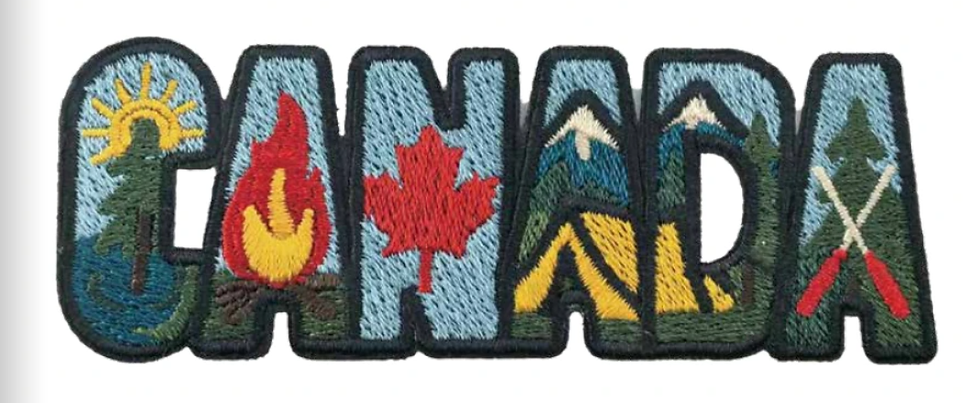 Colourful Canada letters embroidered magnet with textured stitching at Tickled Pink Ottawa.