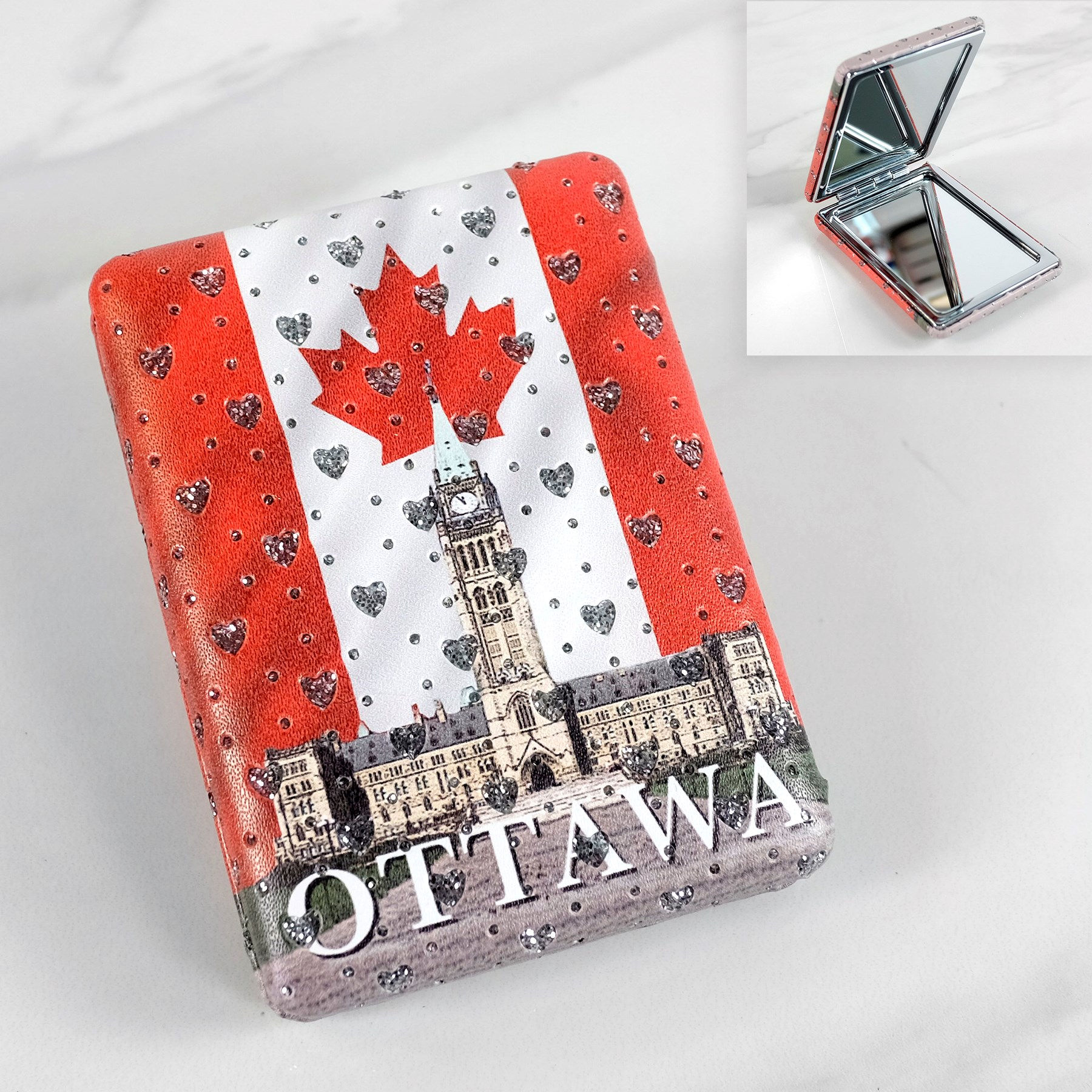 Rectangular red & white mirror compact with Canadian flag & Parliament Buildings, text, Ottawa
