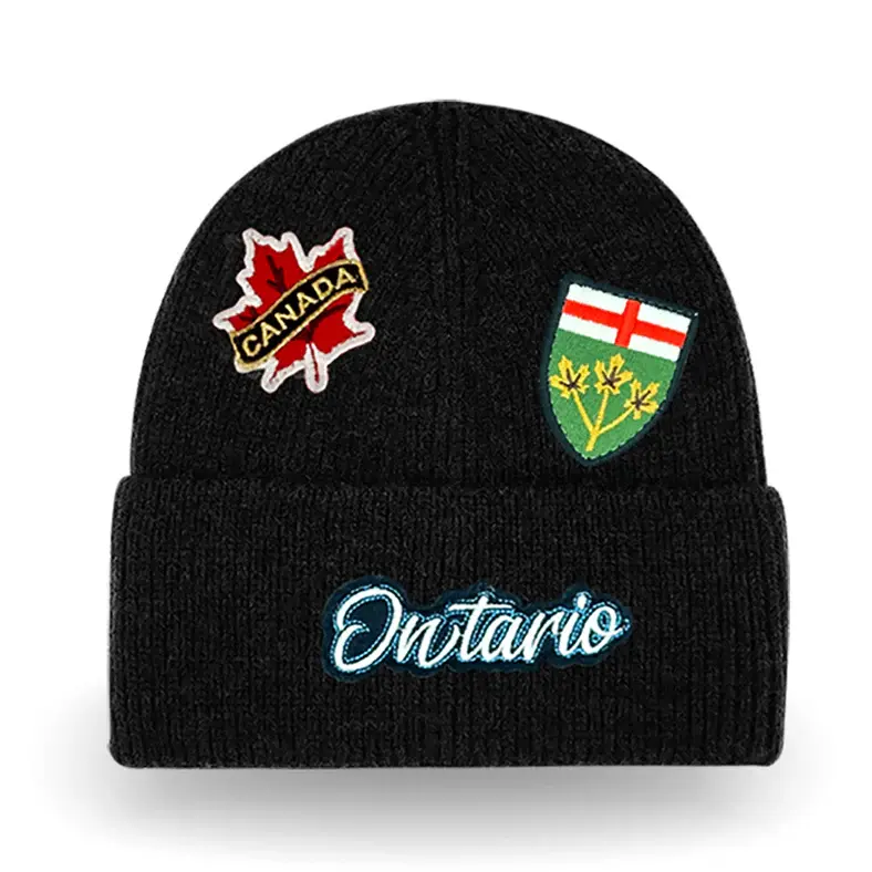 Black knitted cuffed toque with Ontario patches stitched on