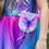Thumbnail: irl in butterfly dress with white U-shaped purse with pink & purple watercolor butterfly