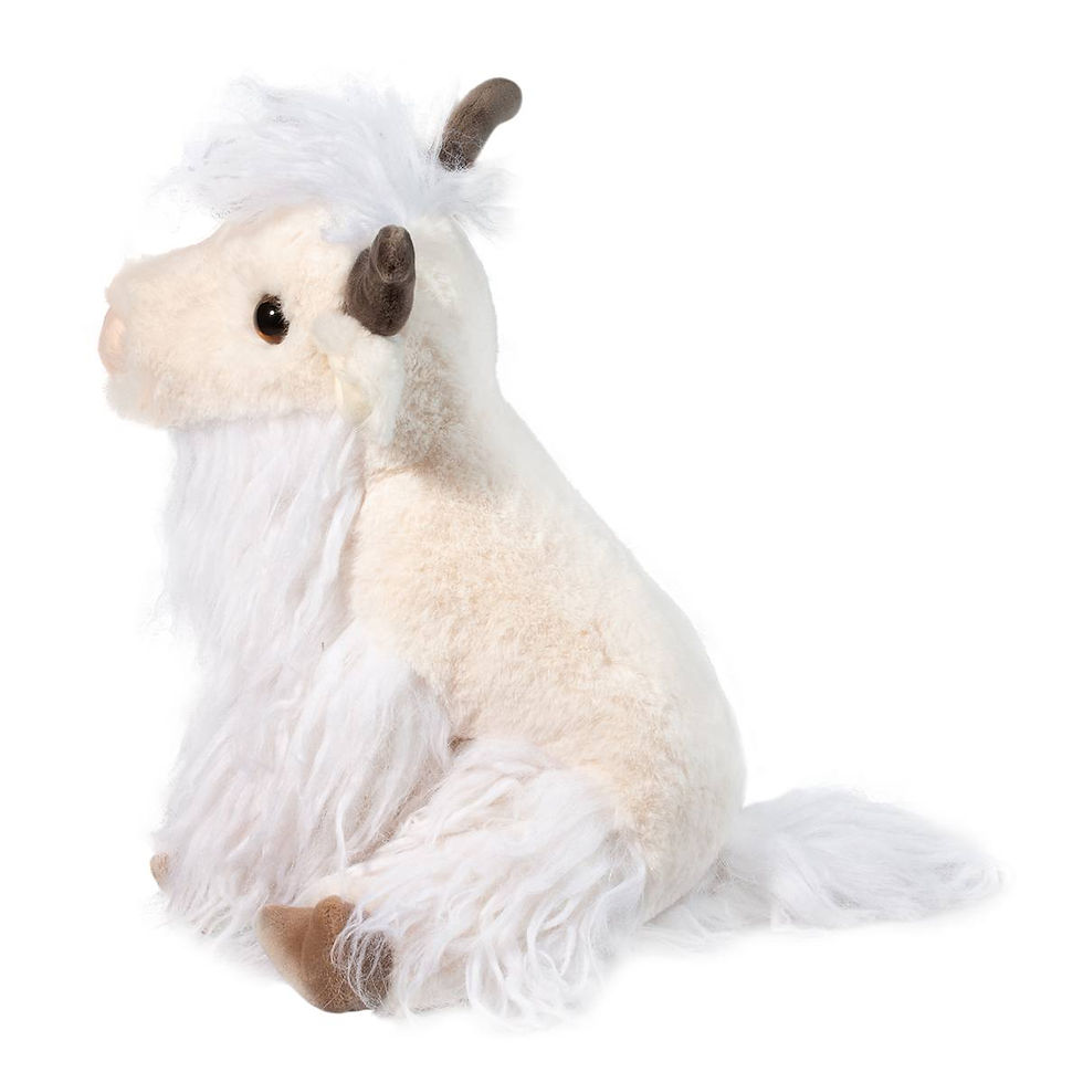 Side view of long haired white yak stuffed toy in seated position with long brown horns