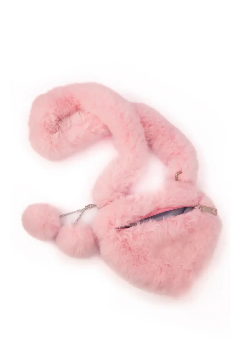 Fuzzy light pink purse in shape of heart with pompoms