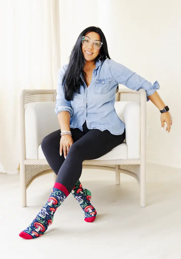 Model wearing Mushroom Magic socks