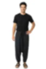 Male modeling solid black harem pants with drawstring waist & gathered cuffs
