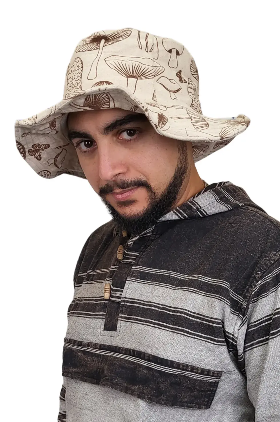 Model wearing beige wire-rimmed sun hat with brown mushrooms print