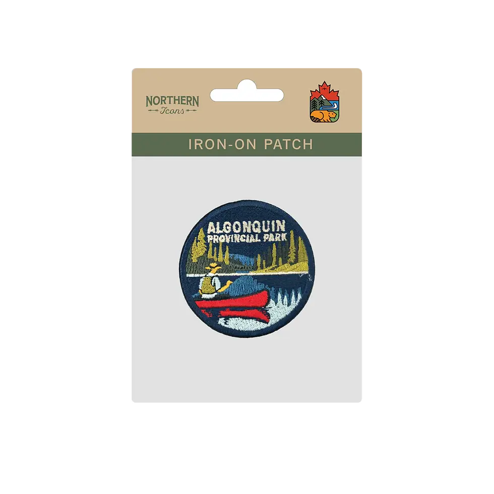 Round blue Algonquin Park with red canoe embroidered patch packaged at Tickled Pink Ottawa