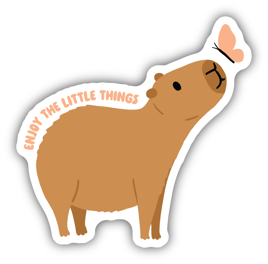 Tickled Pink's vinyl sticker of a capybara looking at a butterfly with the text Enjoy the Little Things.