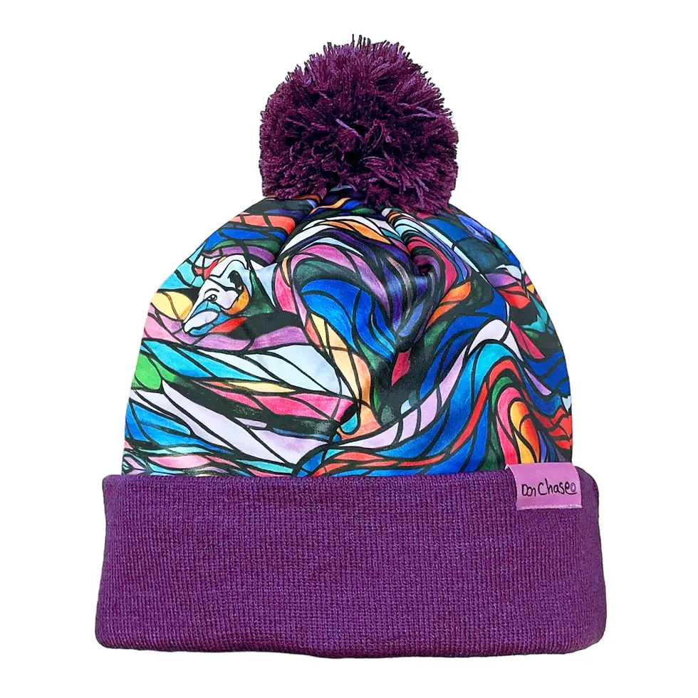 Cuffed purple pompom toque with print of artist Don Chase's colorful Salmon Hunter painting
