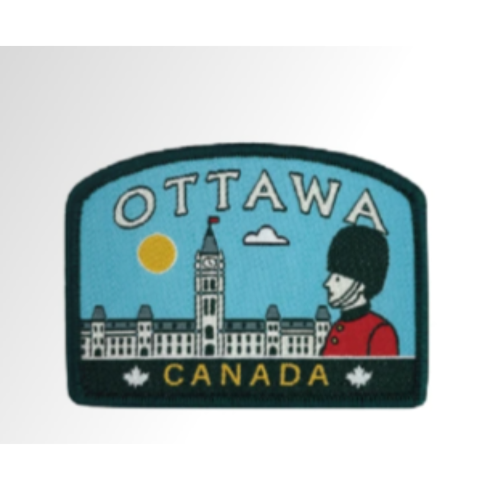 Arched embroidered Ottawa patch featuring Parliament Hill and a ceremonial guard in a bearskin hat at Tickled Pink.