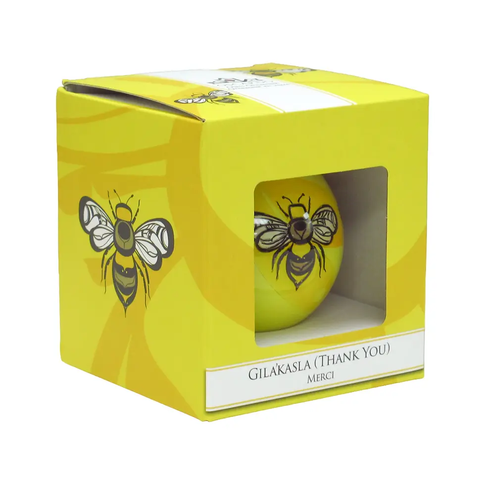 Thumbnail: Boxed Gilakas'la glass ornament designed by Kwakwaka'wakw artist Adam Lewis at Quichua World Market.