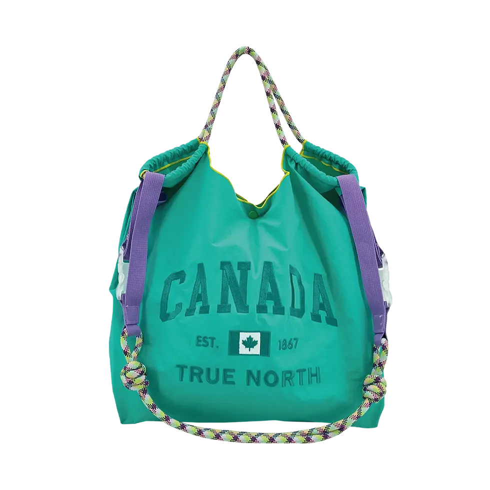 Turquoise Canada True North shoulder bag with purple straps and a multicoloured rope at Tickled Pink.